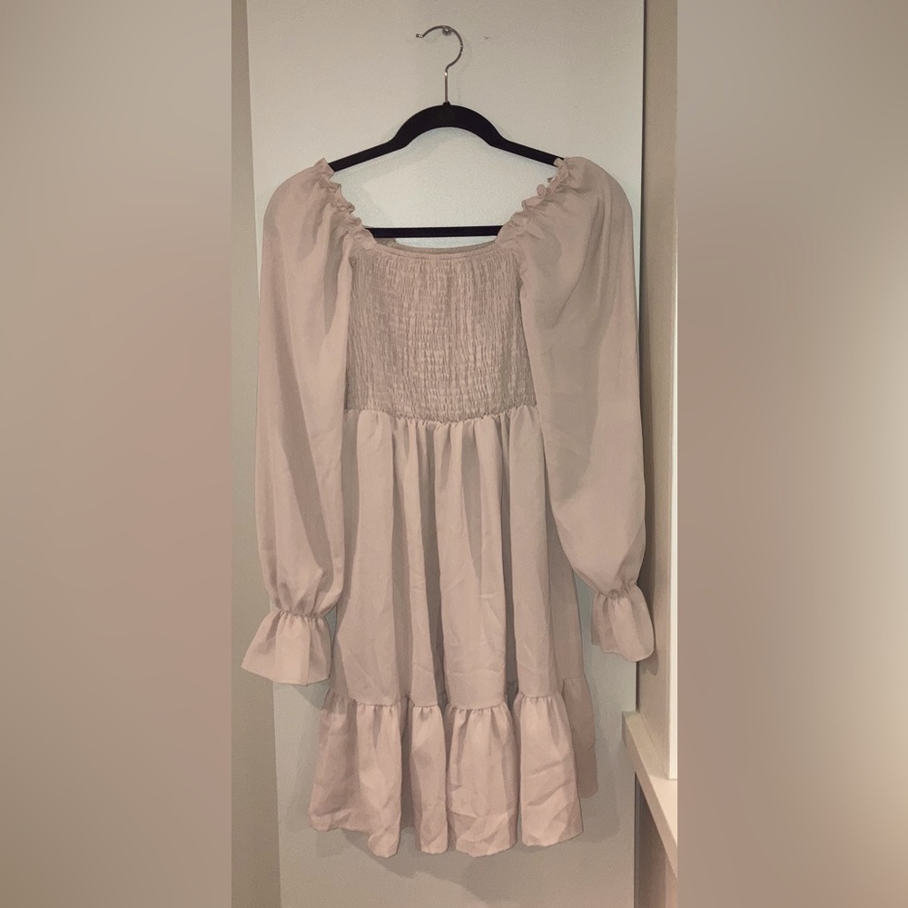 Flowy dress with an off the shoulder design.